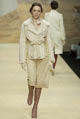 Cream rabbit fur/ suede contrast belted jacket, lipstick chiffon top and fawn suede button front culotte