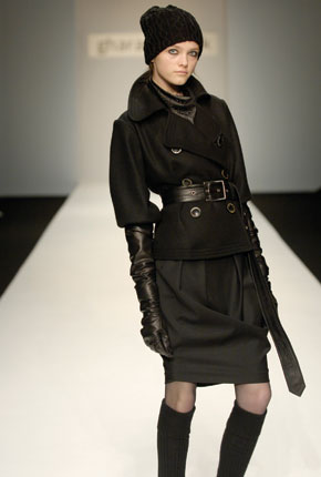 Black chunky wool jacket, black nappa leather trench belt and black wool twill wool tulip skirt 