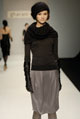 Black fine knit high neck top and mauve grey plain silk tulip skirt 
