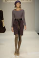 Purple wool knit diamond-ribbed top, purple stretch silk satin leaf detail skirt and black nappa leather trench belt  