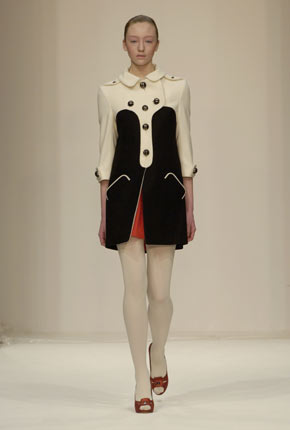 Black chunky wool jacket, black nappa leather trench belt and black wool twill wool tulip skirt 