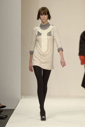 Black fine knit high neck top and mauve grey plain silk tulip skirt