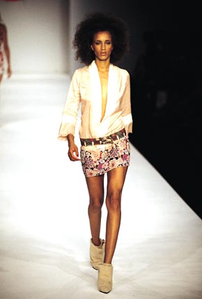 Fringed silk jacket, beaded embroidery mini skirt and leather printed African beaded belt